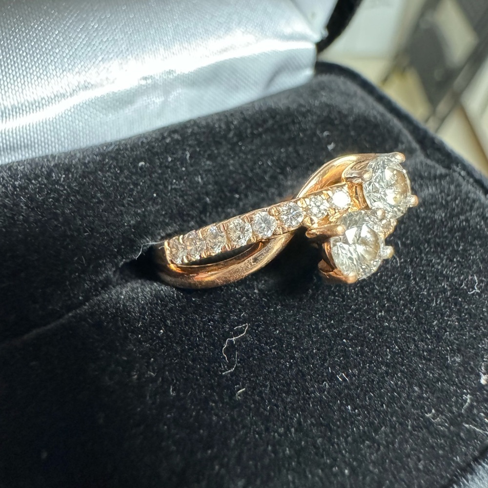 Two stone natural diamond ring with 16 accent stones